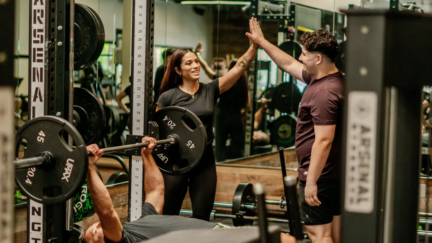 Kayla coaching a client
