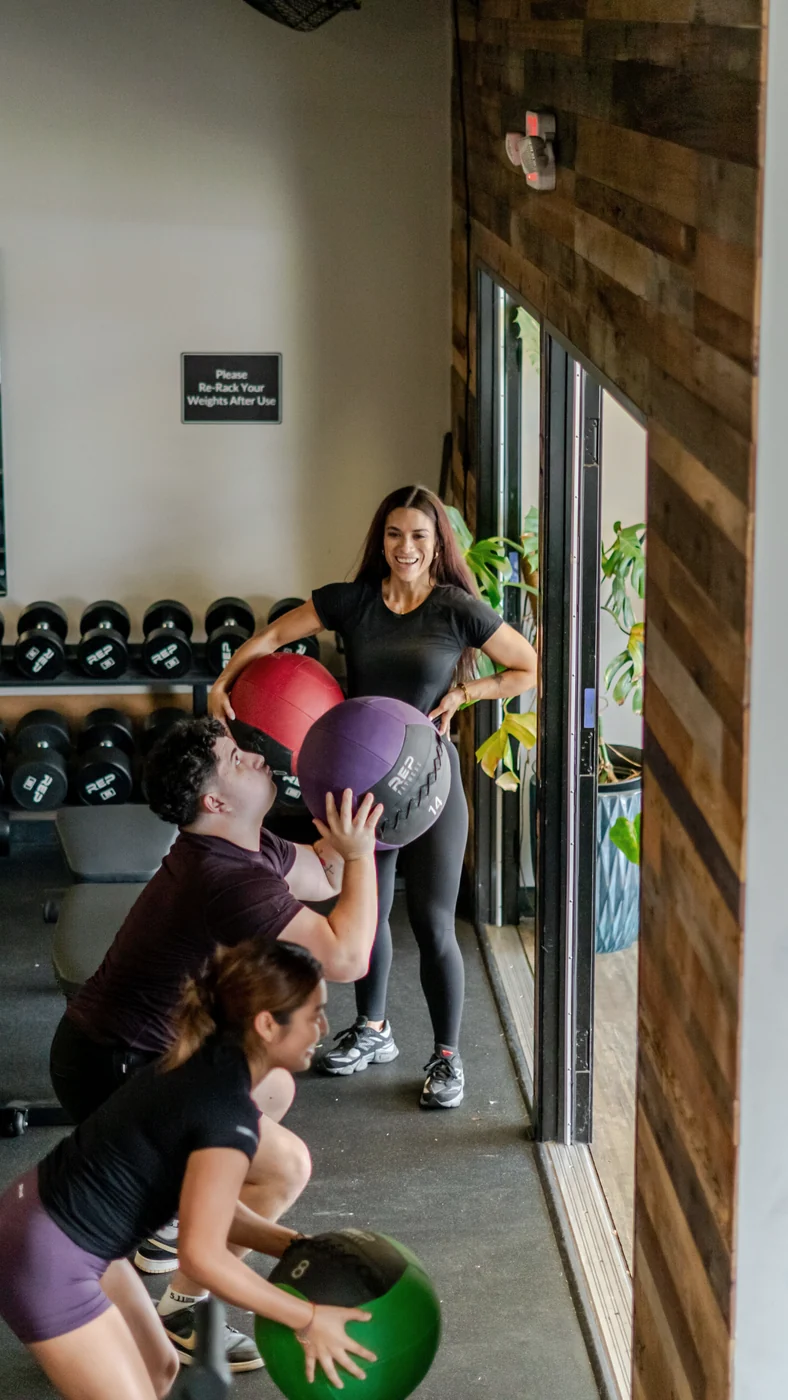 Kayla coaching a client